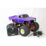 A Tamiya early electric 58065 Clod Buster remote control pick up together with remote control and