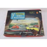 Boxed Triang Minic Motorways M1504 set with both slot cars plus a quantity of additional track