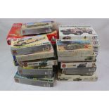 24 boxed plastic models kits, tanks and other military vehicles, various scales and manufacturers,