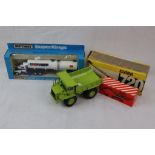 Three boxed diecast models to include O & K Orenstein & Koppel Hydro Mobilbagger MH4, Clark 720,