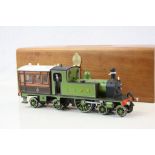 Kit built metal O gauge 4-2-4 LSWR locomotive in green, unmarked, contained within wooden case