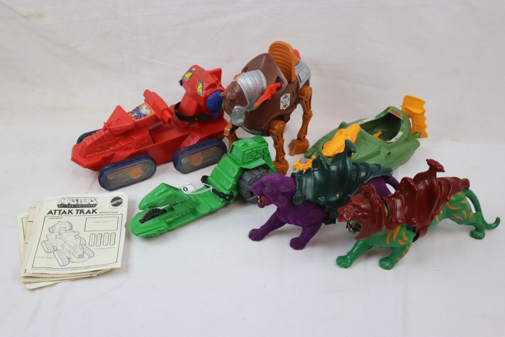 Six original Mattel He Man Masters of the Universe accessories to include Attak Trak, Battle Cat