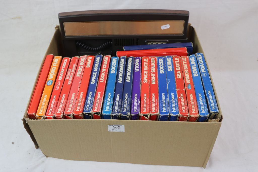 Retro Gaming - Mattel Electronics Intellivision console with 22 x boxed games featuring Bowling, PGA