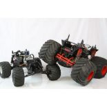 Two 4WD remote control car chassis to include a Tamiya Bullhead Electric and a Traxxas TRX Fuel.