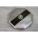 Military interest: enamelled silver octagonal World War II sweetheart compact, with applied Rifles