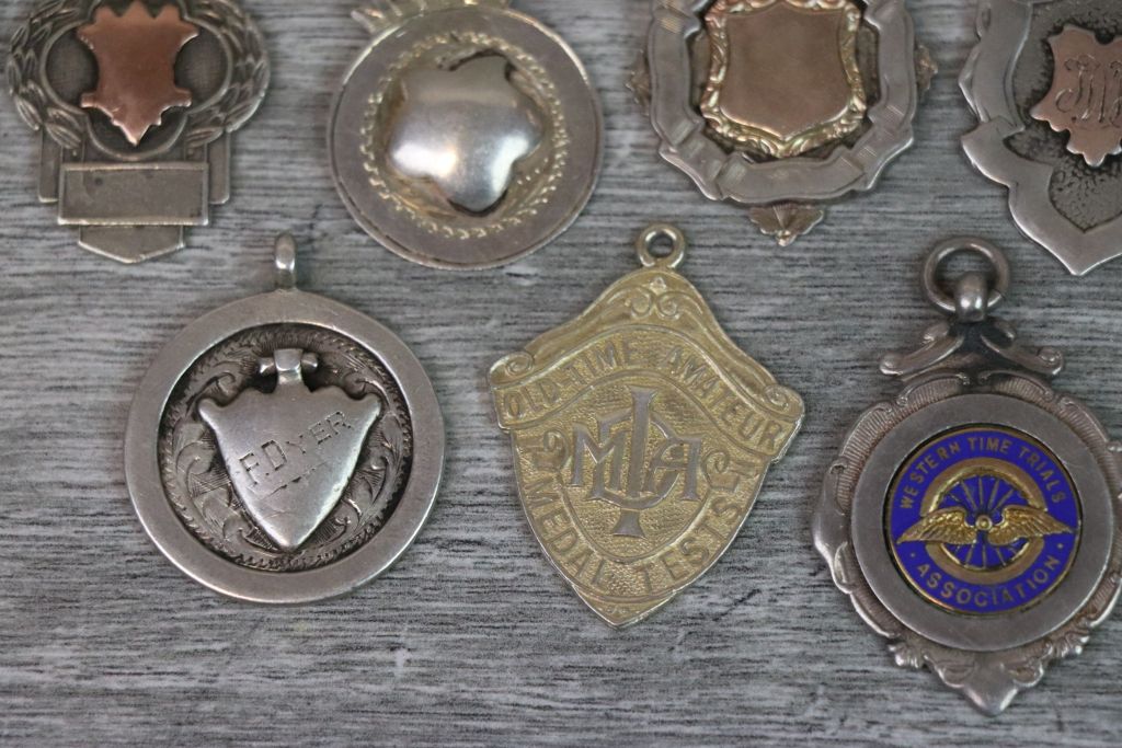 Nine silver fob medallions to include blank cartouches, enamelled Western Time Trials fob, Bagatelle - Image 7 of 7