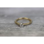 Diamond solitaire 18ct yellow gold ring, the round old cut diamond weighing approximately 0.25