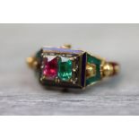 Pink sapphire and emerald enamelled unmarked yellow gold Indian ring, the oval mixed cut pink