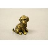 A small bronze /brass figure of a dog.