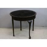 Early 20th century Mahogany Demi-Lune Fold Over Card Table, the front leg terminating in a ball