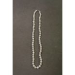 A fine row of cultured pearls with silver clasp