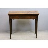 George III Mahogany Fold-Over Tea Table with Cross-banded Top, Fret Fillets and raised on Square