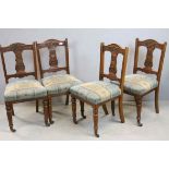 Set of Four Edwardian Dining Chairs with Carved Backs and Stuff Over Seats raised on turned ringed