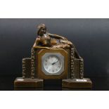 Art Deco bracket clock decorated with woman