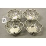 Set of four Hallmarked Silver Bonbon type Dishes on tripod feet with Pierced decoration to the