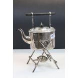 An antique Richard Richardson silverplated Christopher Dresser design spirit kettle