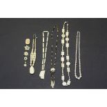 Tin of mixed Bone jewellery, mainly Necklaces