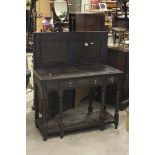 17th century Style Oak Side Table, the back panel carved with lunettes, over three drawers and