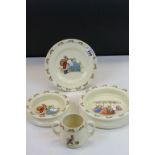 Group of Royal Doulton Bunnykins, to include two bowls, plate and a loving cup