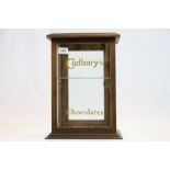 1930's Cadbury's Chocolate glazed Wooden Display cabinet with single shelf and lettering to front,