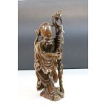 19th Century Chinese Hardwood carving of an Immortal, approx 44cm tall
