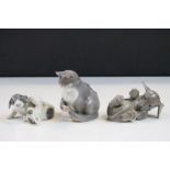 Three Royal Copenhagen ceramic models of Animals to include; sitting Cat number 1553 ME, pair of