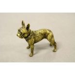 A bronze/brass figure of a French Bulldog,