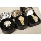 Three boxed Gents Quartz Watches, coin set to include; Half Crown, Penny & Two Shillings