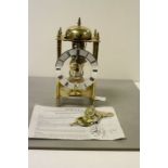 Sewills of Liverpool key wind Skeleton type Brass Mantle clock, movement numbered 701 - 081 & stands