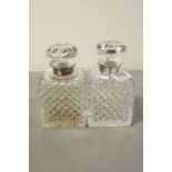 Pair of cut Glass Decanters with Hallmarked Silver collars and each approx 16.5cm tall