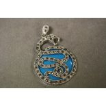 An interesting silver and marcasite Chinese dragon necklace pendant
