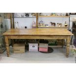 Large 19th century Rustic Pine Farmhouse Kitchen Table with Drawer to end and raised on turned legs,