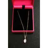 An 18ct rose gold diamond pendant of 20 points on gold chain