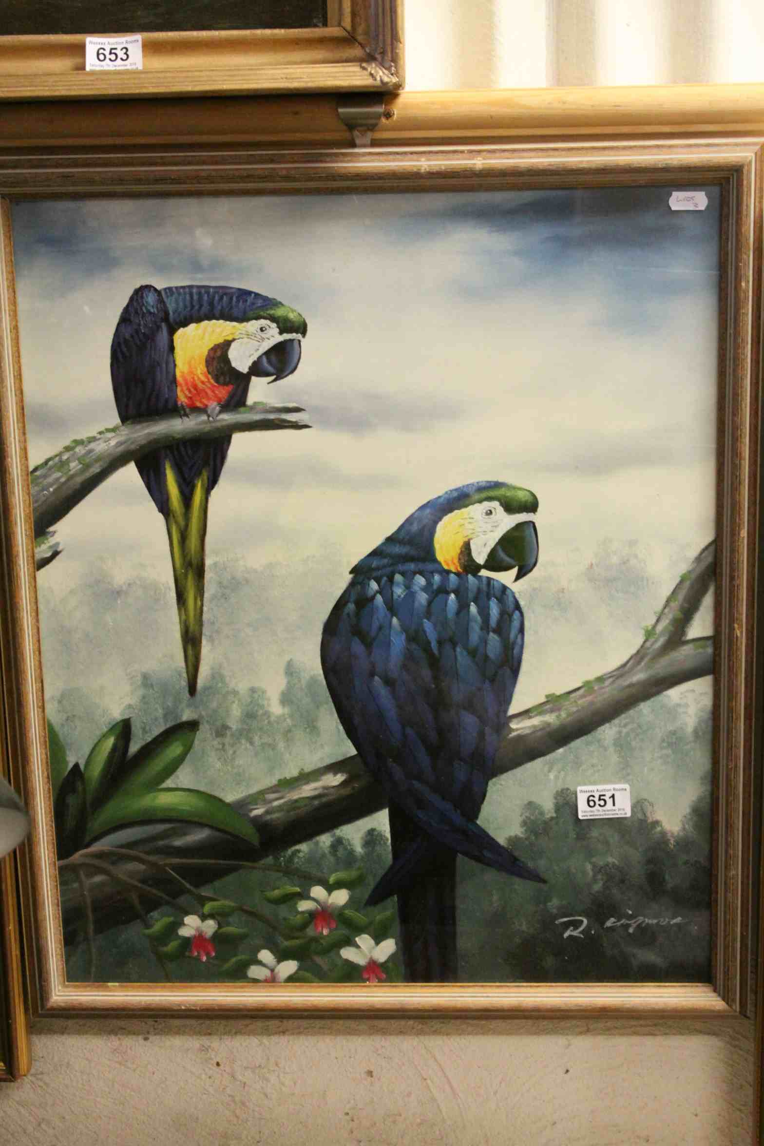 An ornithological oil painting study of Blue Macaws on tree bough signed R Kingman