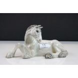 Beswick ceramic model of a Grey Shire Horse lying down, number 2459