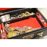 Jewellery box containing Art Deco silver rings, silver charms, bracelets, yellow metal chain and
