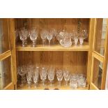 A large quantity of cut glass to include wine glasses ,brandy balloons, tumblers some Stewart