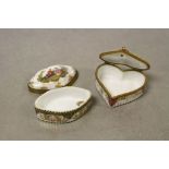Two vintage hand painted ceramic Trinket boxes, one heart shaped and both with Meissen crossed