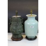 Oriental celadon lamp and one other oriental bronze lamp in the form of a temple vase