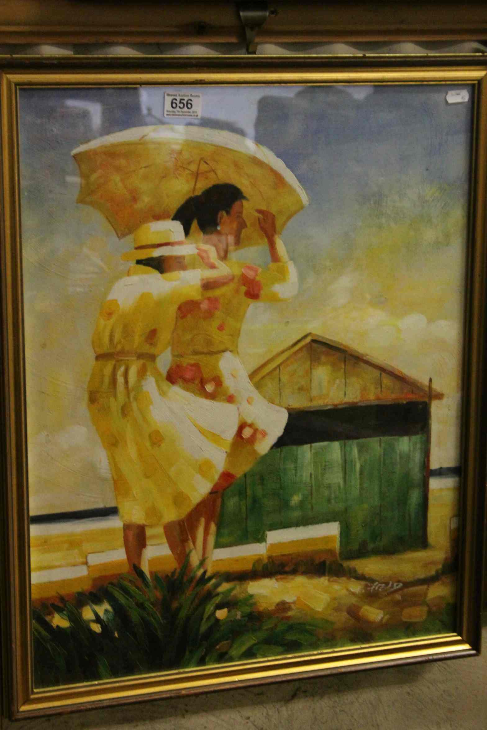 Gilt framed oil painting in the style of Jack Vettriano ladies with parasol on a beach, signed