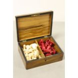 Sorento Olive wood box with Marquetry picture to lid and containing a 19th Century Bone Chess set