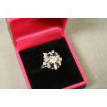 An 18ct white gold Art Deco style diamond and sapphire dress ring 1.2ct approx