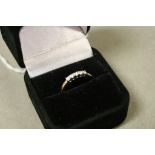 An 18ct yellow gold diamond half eternity ring of 20 points