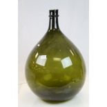 Large green glass carboy