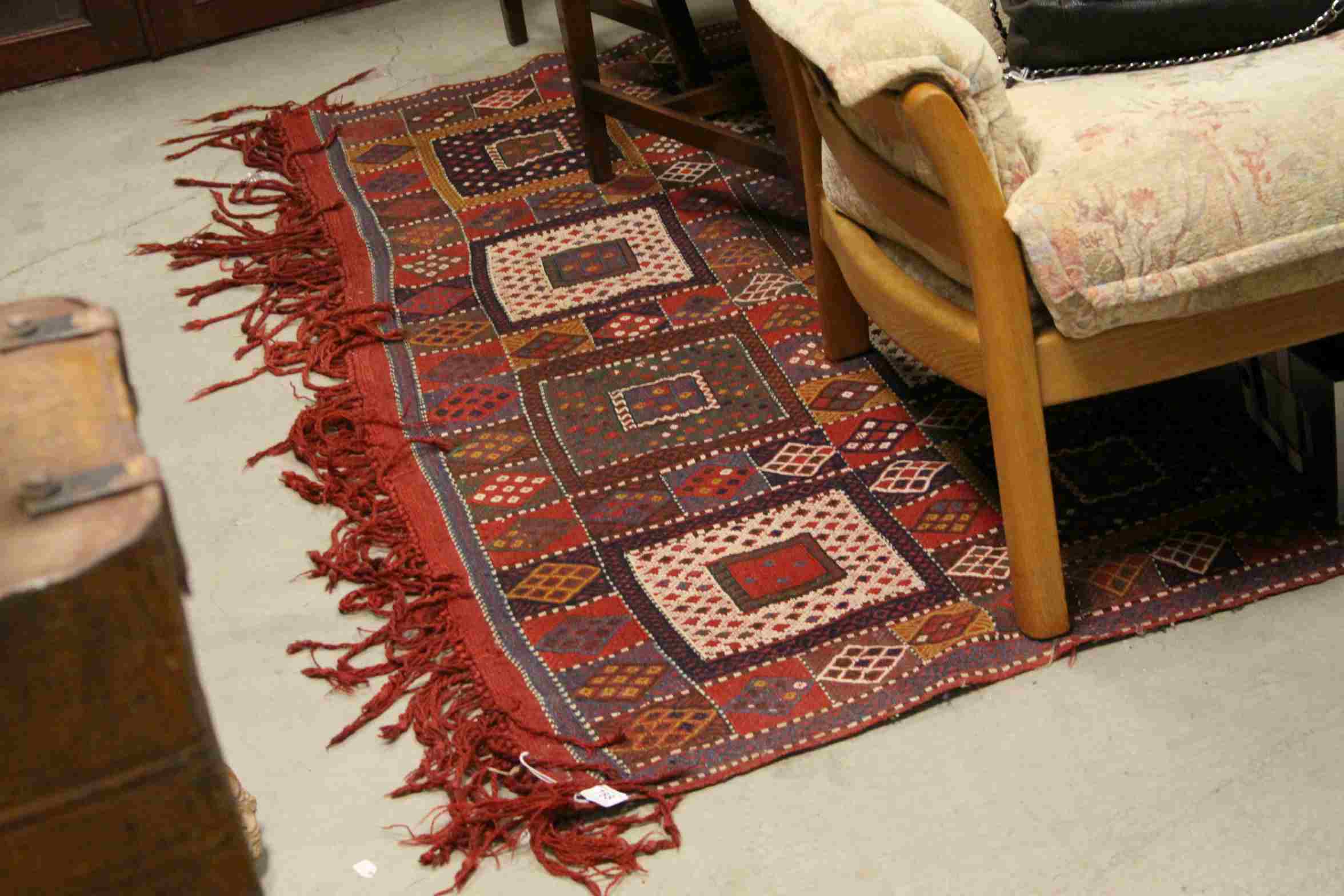 Red Ground Rug, approximately 282cms x 183cms