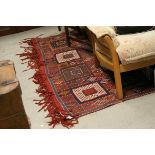 Red Ground Rug, approximately 282cms x 183cms