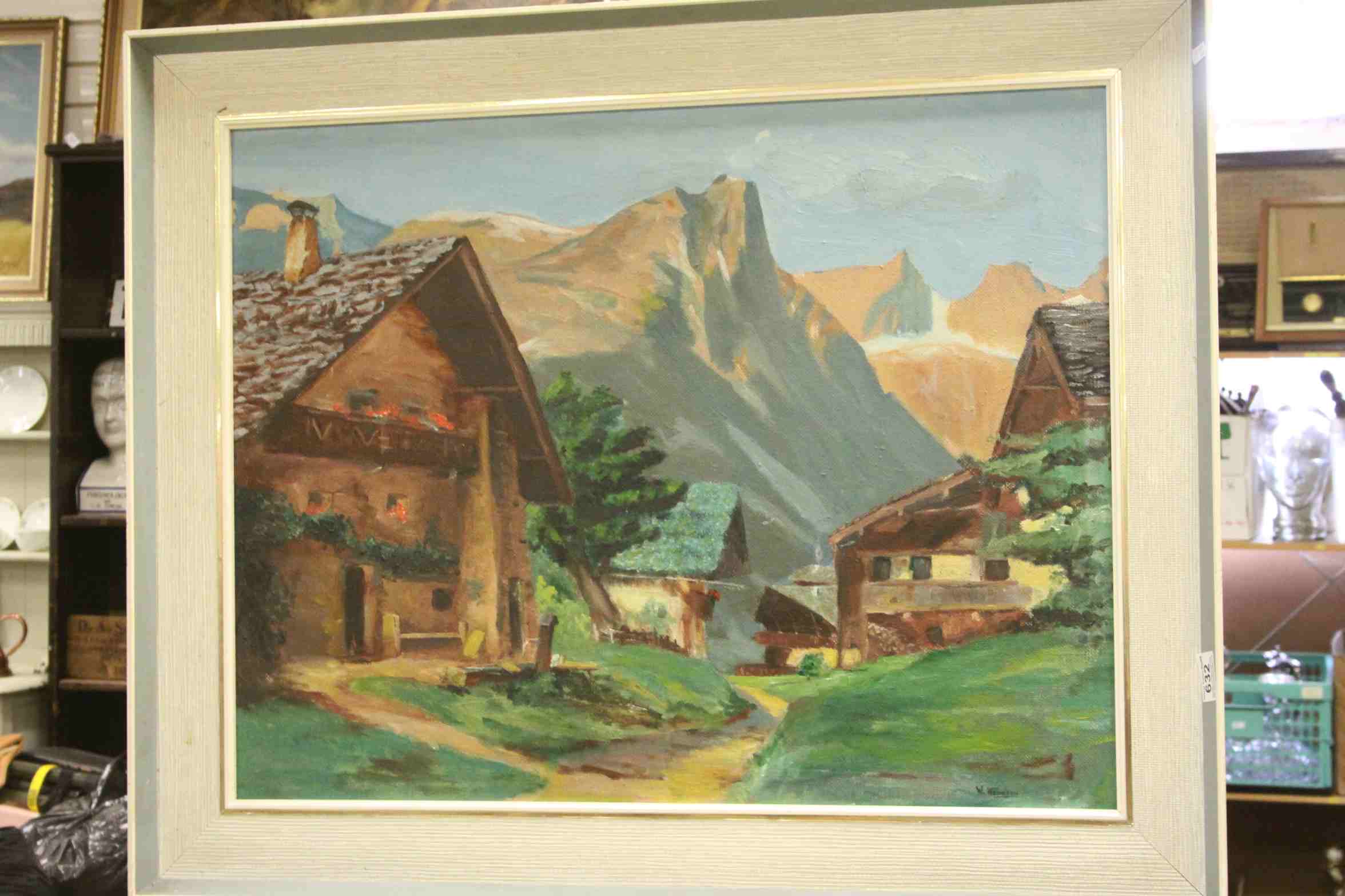 W Hogsen oil on board a view of an alpine village with mountains beyond