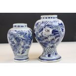An 18th century Dutch Delft vase, of globular shape decorated in the Chinese taste and another