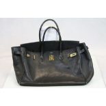 20th Century black textured Hermes bag of used condition