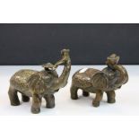 Pair of bronze elephants with four character marks to base